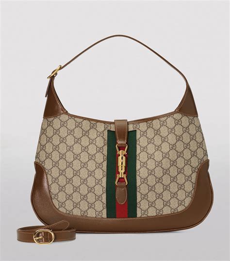 gucci cloth jackie bag with gold g 1976|Gucci jackie 1961 transparent bag.